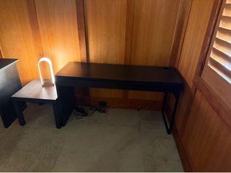 Two small black desks