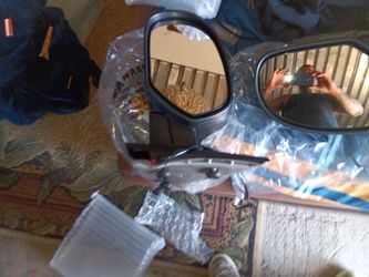 Silverado Tahoe left and right mirrors with signal lights brand new in the