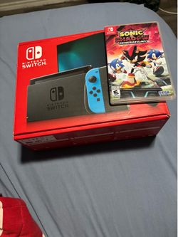 Nintendo switch in box like new + game of Sonic