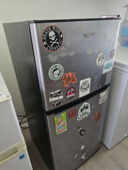A small-sized refrigerator; itworks very well