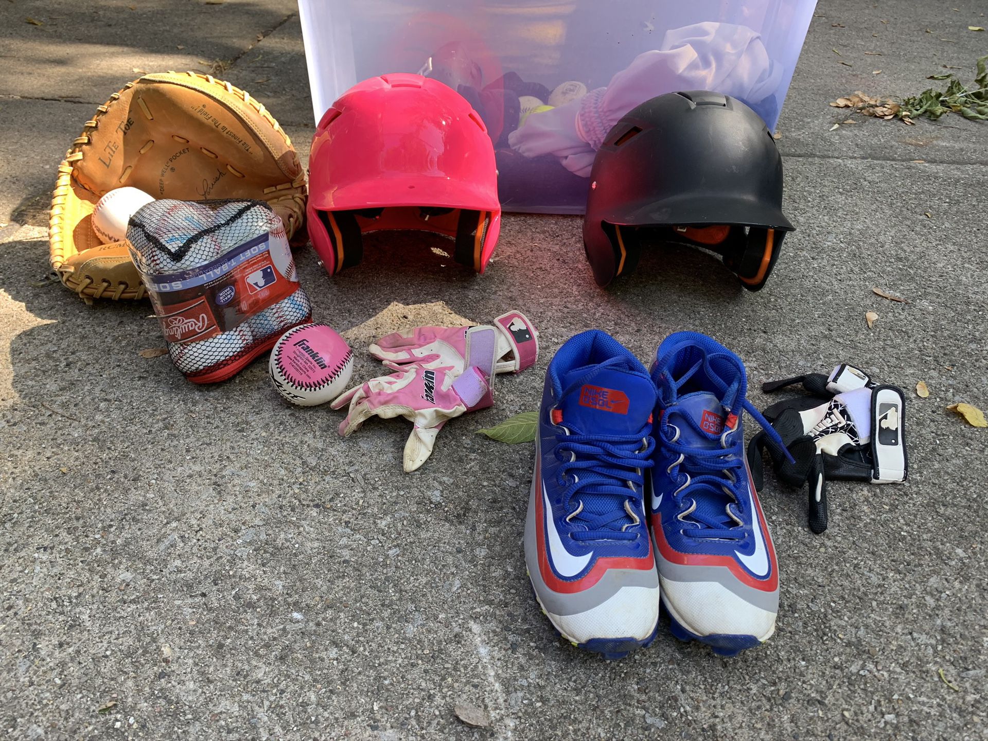 Two Baseball Batting Helmets, gloves, and other equipment