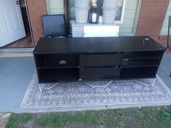 Large entertainment center with glass. Shelves