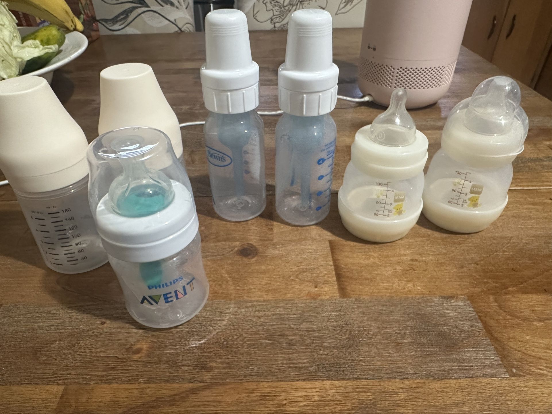 5 baby bottles and 2 breast milk storage bottles.