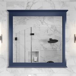 Two Blue Framed Mirrors