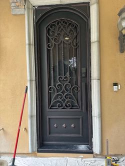 Wrought Iron Single Entry Door with Glass