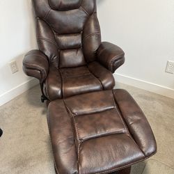 Brown Leather Swivel Recliner And Ottoman