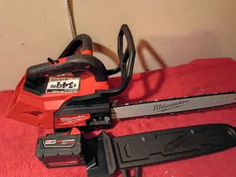 M18 MILWAUKEE FUEL 14" chainsaw tool and battery $300