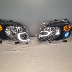 2006-11 Chevrolet HHR Headlights brand new w/ film