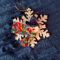 Snowman in a snowflake Christmas ornament