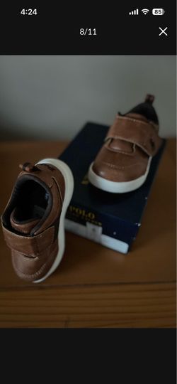 There very cute shoes for Boys the size is 6 The color is Tan Brown it’s made by RALPH LAUREN