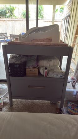 Baby changing table and infant bath seat