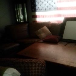 3 Piece Leather Sectional. Has Hideaway bed and An End Recliner 