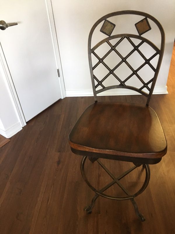 4 woodland wrought iron counter height chairs. Two swivel and two