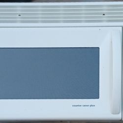 GE Microwave Topstove With Estractor 
