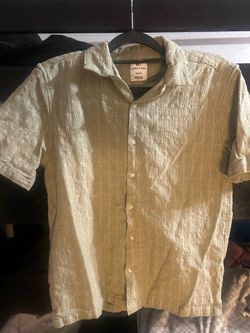 Light green buttons up shirt