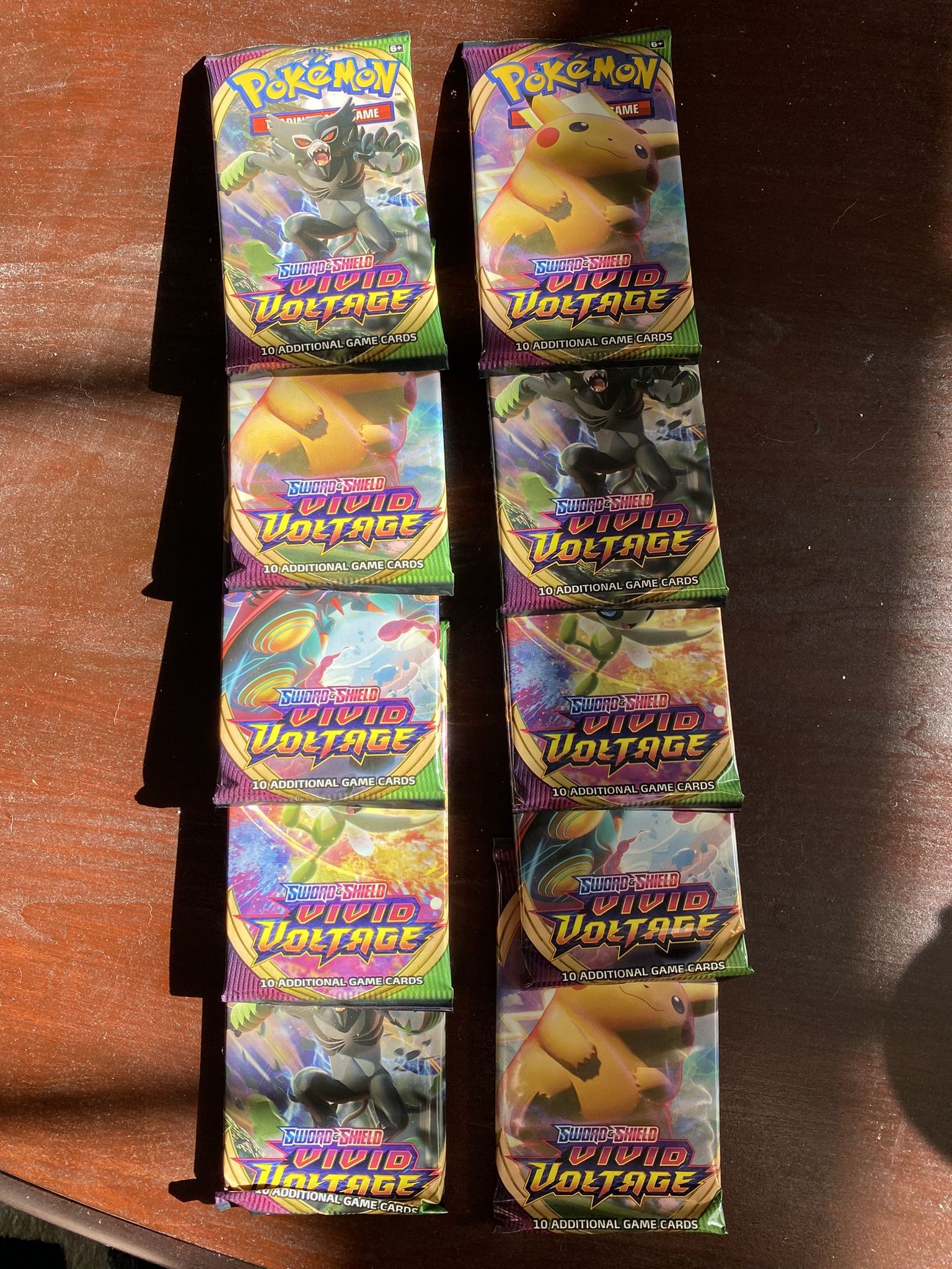 10 booster packs Pokémon sword and shield vivid voltage trading cards