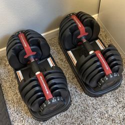 Bowflex adjustable dumbbells (5 to 52.5 lbs), brand new, never used.