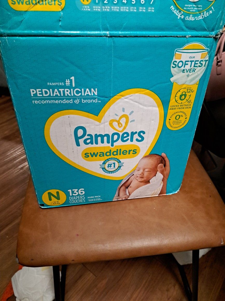 136 Newborn & 20 Size 1 Diapers