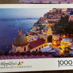 1000-piece jigsaw puzzle featuring a night sea view of Positano, Italy