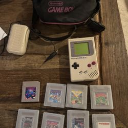 Nintendo Gameboy And 8 Games