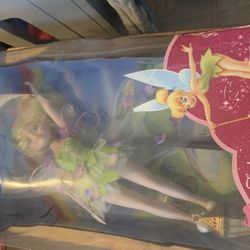 Porcelain Disney area and Tinker Bell new $25 each great Christmas gift