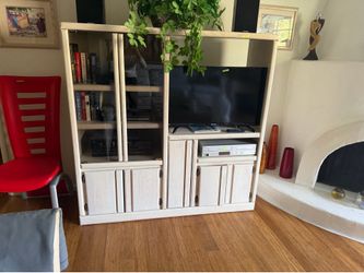 Vintage rattan queen sleeper sofa set with glass coffee table and entertainment Centre