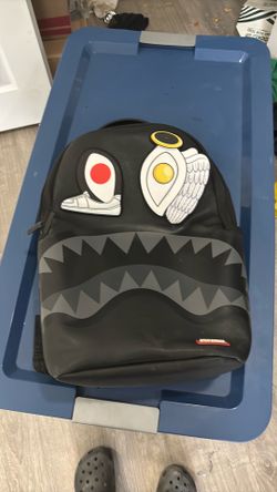 Spray ground backpack