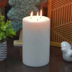 {ONE} Unscented pillar candle. Overall: 5”x8”. Color: white. MSRP: $67. Our price: $44 + Sales tax