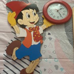 Wood pinocchio wall clock from Italy  Hand made 