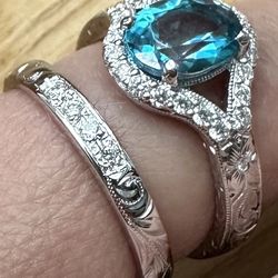 Hand Engraved Platinum Topaz and Moissanite ring. Matching diamond White gold wedding band.