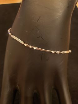 STERLING chain twist bracelet. 7 inches. Marked 925 Italy.