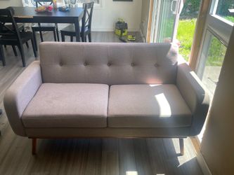 Sofa 60” wide in tan color not much use good shape