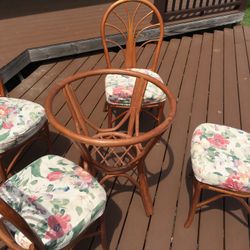 Rattan Wicker  Table w/ 42” Glass. And 4 Chairs