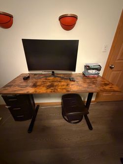 Adjustable desk with chair