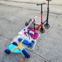 Set Of New Kids Scooters And Tricycle
