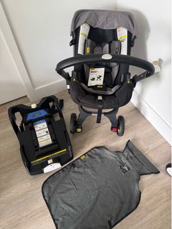 Doona car seat and stroller + base