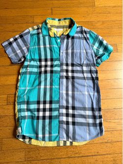 Burberry Children's size 14Y button-down shirt features a distinct patchwork design of blue and yellow plaid patterns