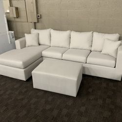 White Cream Sectional Couch And Ottoman 