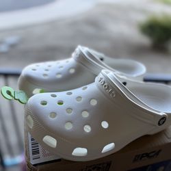 Brand New Crocs Men’s size (9) Women (11)