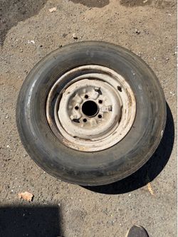 1950-56 Oldsmobile 15” wheel and tire