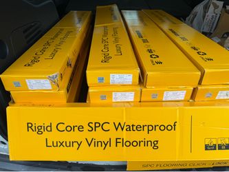 Brand New Waterproof Vinyl Flooring in Box