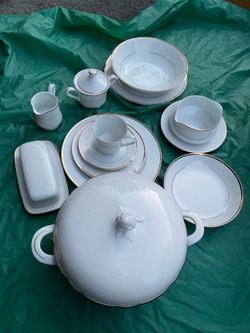 Set of 12 plus extra pieces  German white plates with gold lines like new please check my other listings