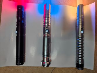 Three XRGB light  sabers by Neo Sabers