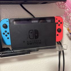 Nintendo Switch + Extra Controllers & Games
