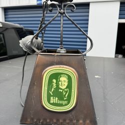  This is a Bitburger beer lamp, likely from the 1970s or 1980s