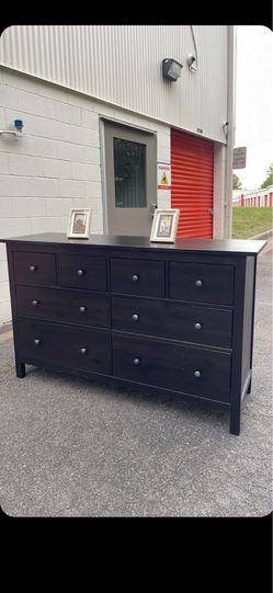 Modern black solid wood long dresser. Drawers sliding smoothly