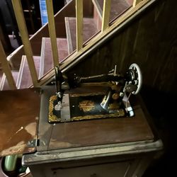 singer sewing machine table (taking best offer)