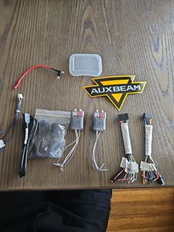 Random atoto connections and auxbeam sticker, fuse adapter, and cover for panel