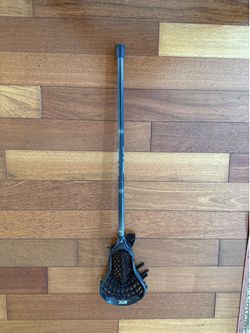 2 lacrosse sticks
