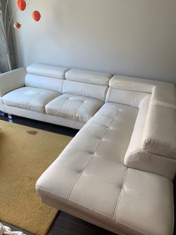 Sectional sofa in good condition and very comfortable for sitting and lying down.